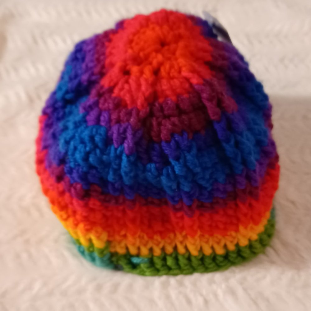 Children's multicolor knitted small hat, hand crafted